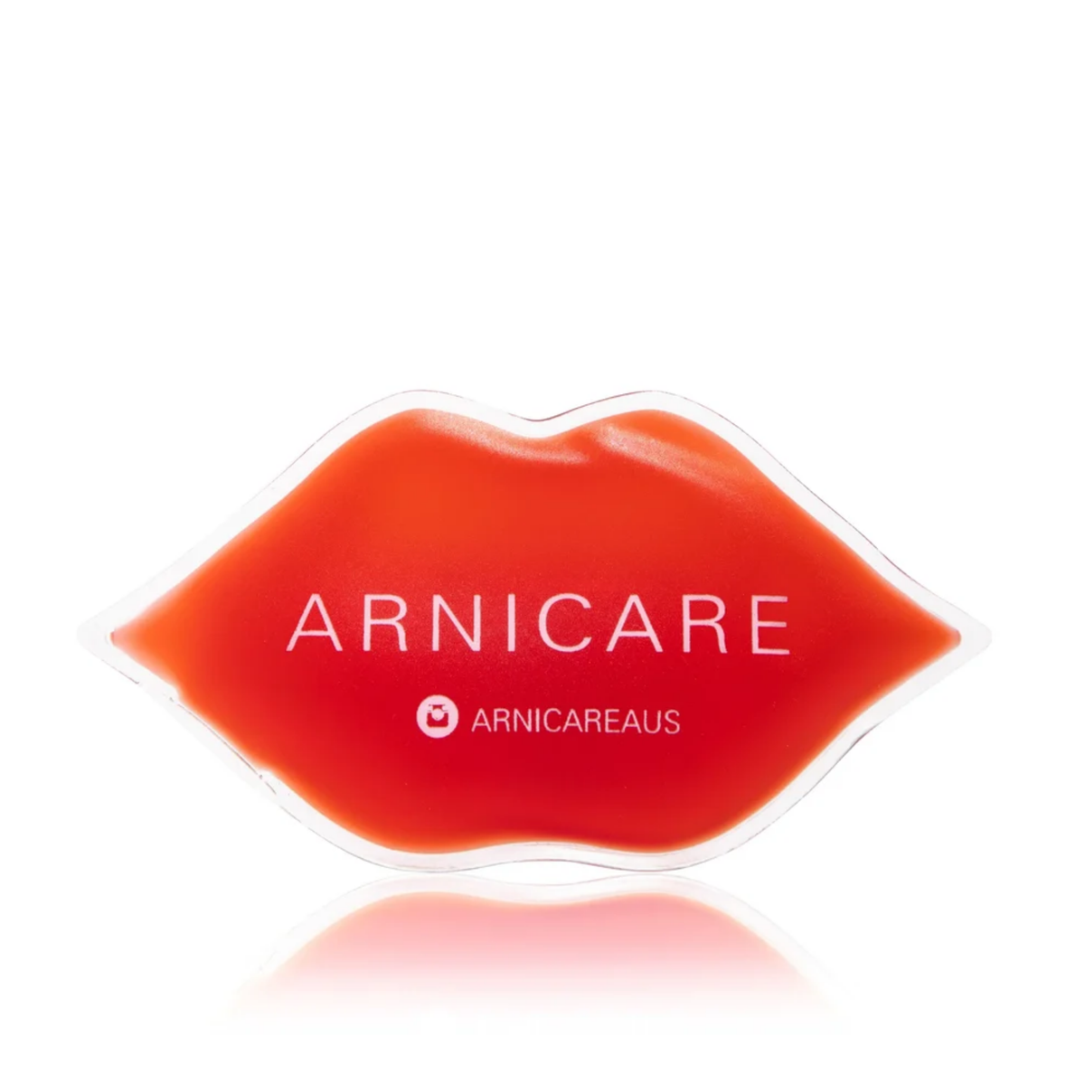 A lip-shaped red cosmetic product with the brand name ARNICARE and ARNICAREAUS visible on the front, set against a clean white background with a soft reflection below.